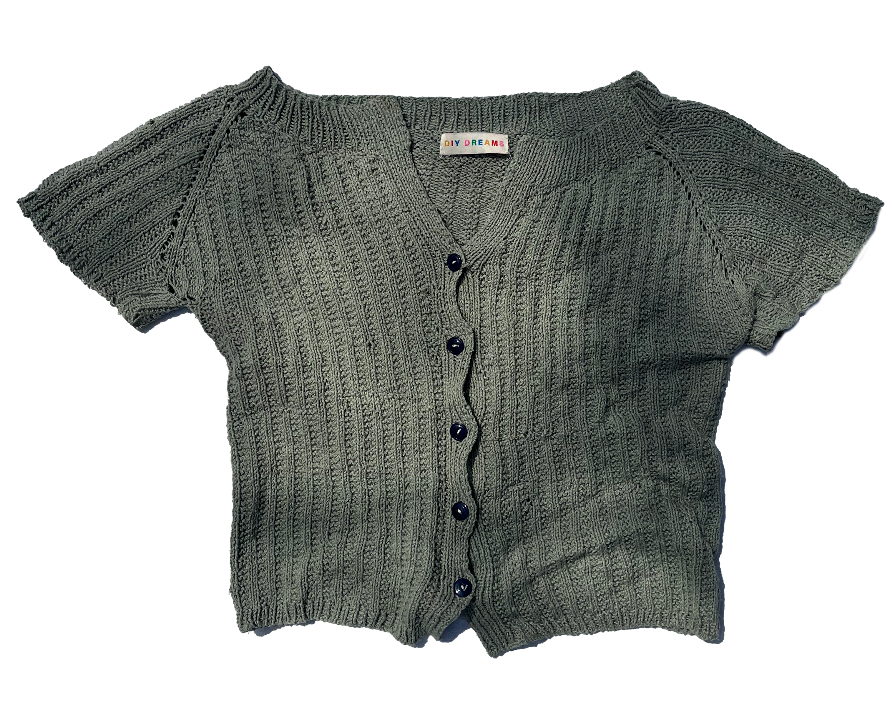 a green knit top